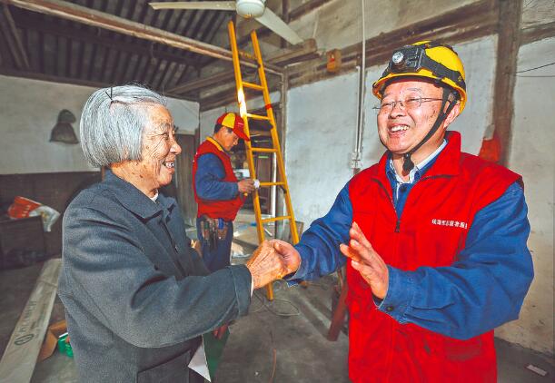 時代楷?！泵鎸γ?錢海軍：黎明同志步履不停 點(diǎn)亮萬家燈火