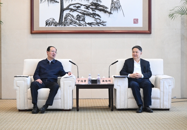 丁焰章與中國華能董事長、黨組書記溫樞剛會談